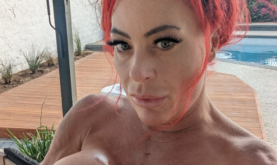 Fit and Busty Red Head Bambi Jo
